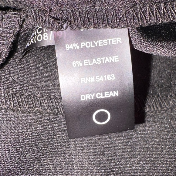 Tommy Hilfiger Black Long Sleeve V-Neck Jumpsuit with Chain Detail; Size 2 - Picture 11 of 13